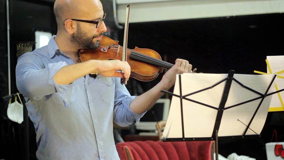 A musician playing the violin